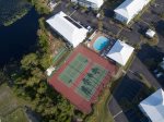 Aerial view of main pool, tennis courts and shuffleboard.